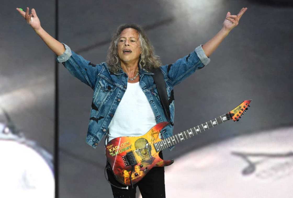 Kirk Hammett onstage with a guitar Kirk Hammett onstage with a guitar