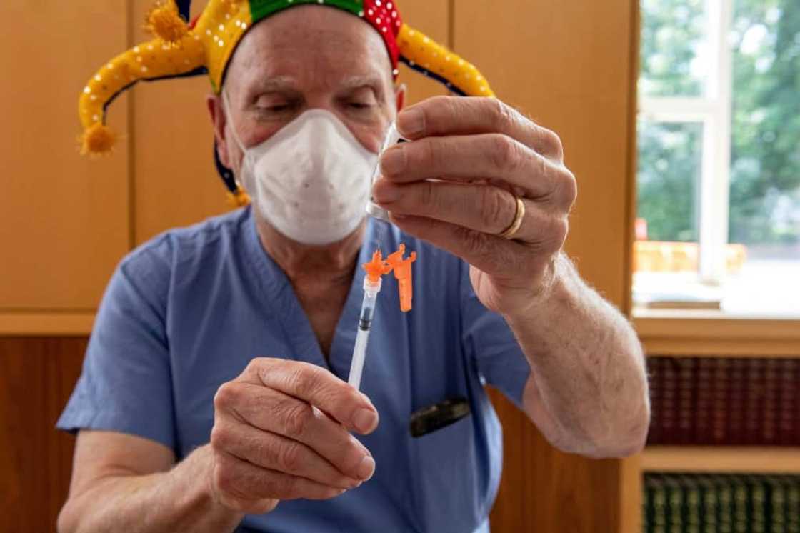 A medical workers draws the new Moderna Covid-19 Child Vaccine from a vial at Temple Beth Shalom in Needham, Massachusetts A medical workers draws the new Moderna Covid-19 Child Vaccine from a vial at Temple Beth Shalom in Needham, Massachusetts