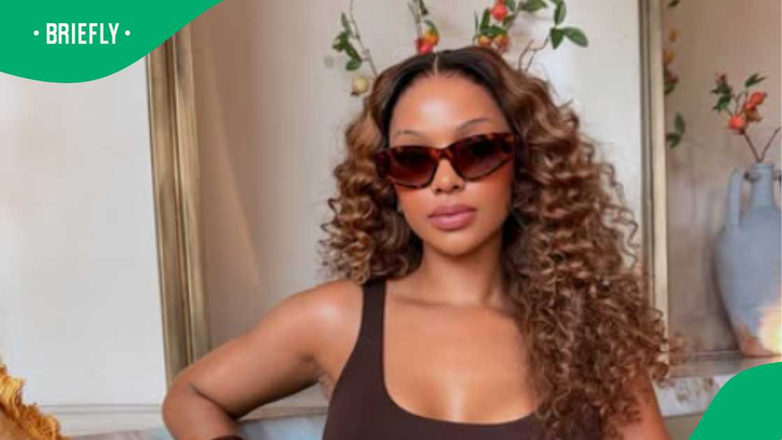 Mihlali stunned in an elegant orange dress Mihlali stunned in an elegant orange dress