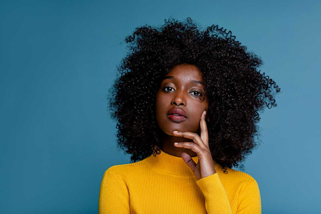 A girl shared how she was kicked out of school for having an afro