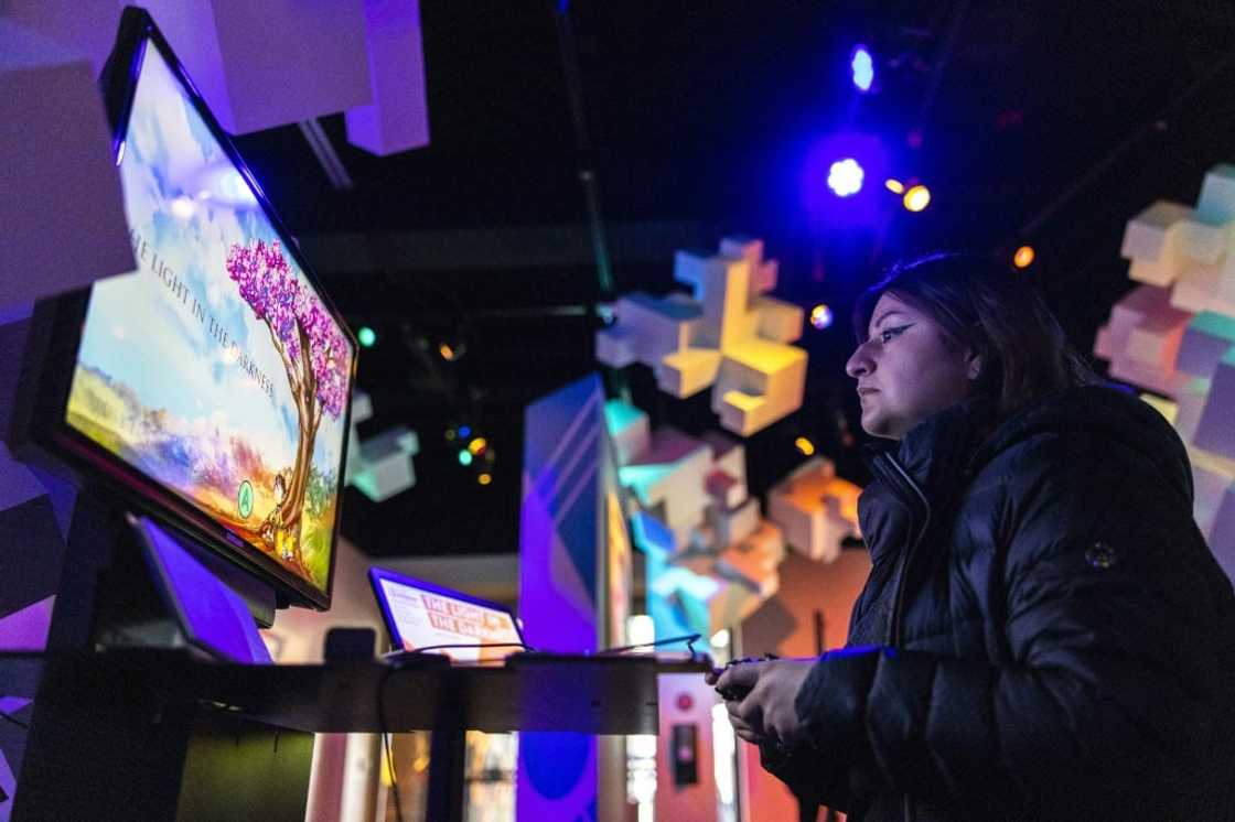Jacquelyne Vargas, 17, plays 'The Light in the Darkness,' a video game about a family of Polish Jews in France during the Holocaust, at the Museum of Pop Culture in Seattle on February 23, 2023 Jacquelyne Vargas, 17, plays 'The Light in the Darkness,' a video game about a family of Polish Jews in France during the Holocaust, at the Museum of Pop Culture in Seattle on February 23, 2023