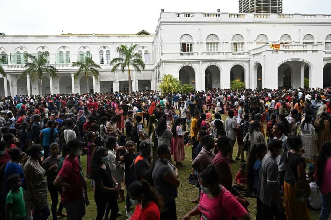 Sri Lanka's president left behind cash worth $50,000 when he fled his official residence, which is now drawing crowds for whom the palace would normally have been off limits Sri Lanka's president left behind cash worth $50,000 when he fled his official residence, which is now drawing crowds for whom the palace would normally have been off limits