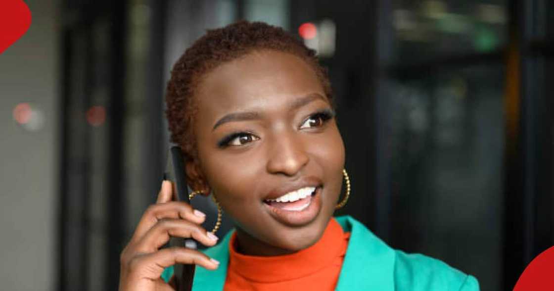 A woman speaking on the phone. A woman speaking on the phone.