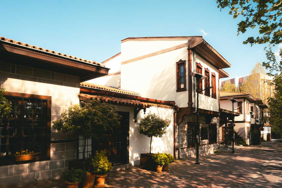 Traditional houses on a sunny street Traditional houses on a sunny street