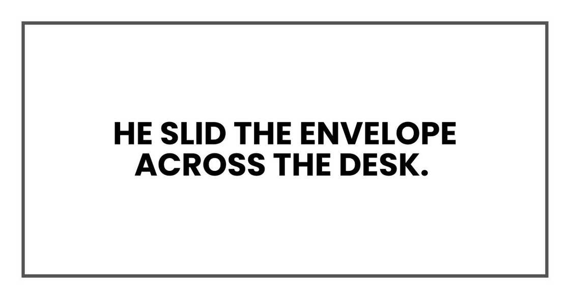 He slid the envelope across the desk.