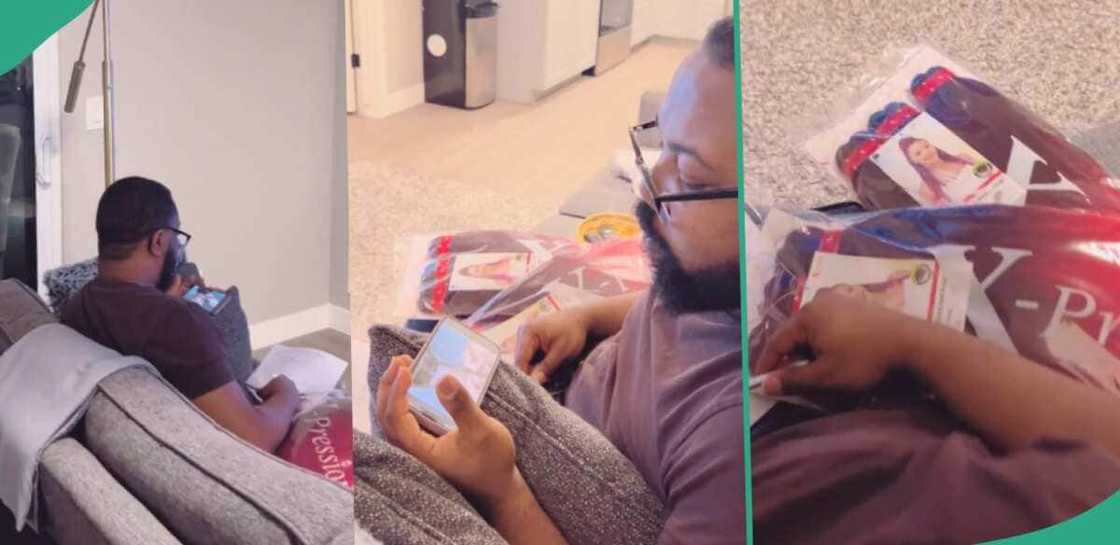 Man takes notes as he learns hair braiding online Man takes notes as he learns hair braiding online