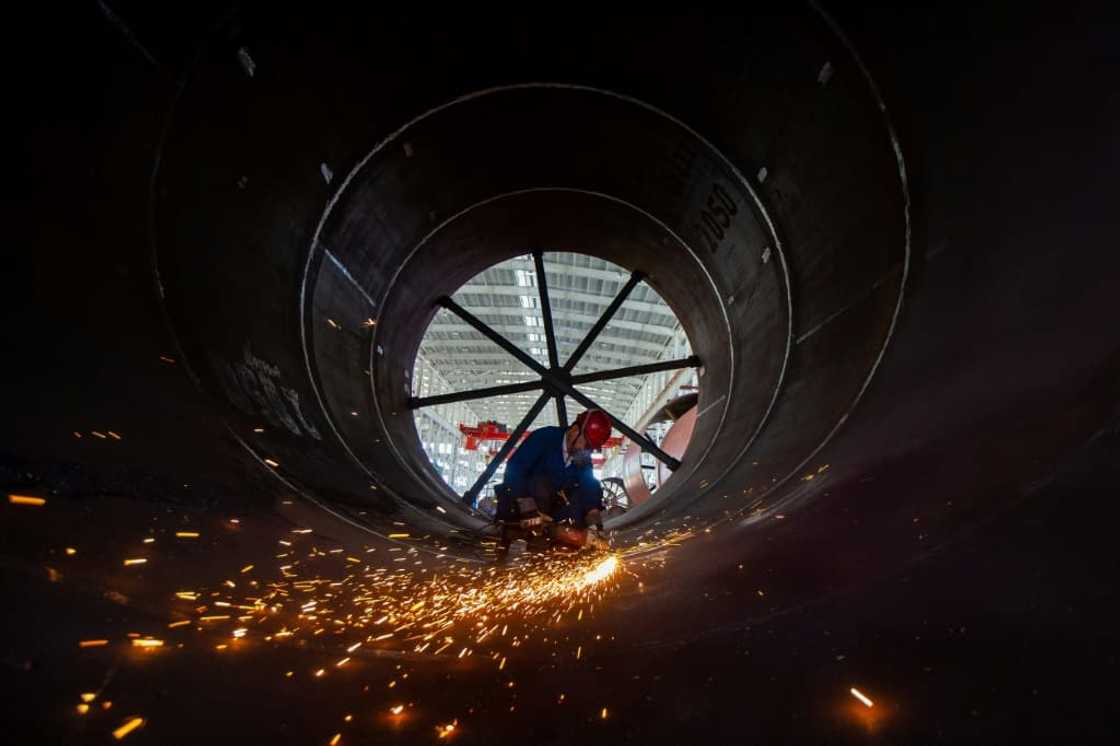 Fresh data showing that China's factory activity shrank again last month has fuelled talk of fresh stimulus for the economy Fresh data showing that China's factory activity shrank again last month has fuelled talk of fresh stimulus for the economy