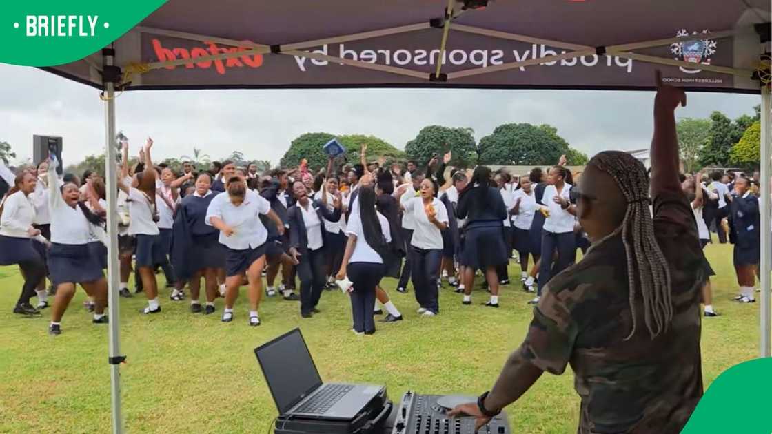 A DJ performing at a school. A DJ performing at a school.
