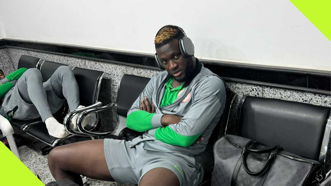 Victor Boniface sits dejectedly at the Al Abaq airport in Libya.