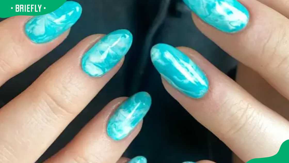 Teal blue almond nail design Teal blue almond nail design