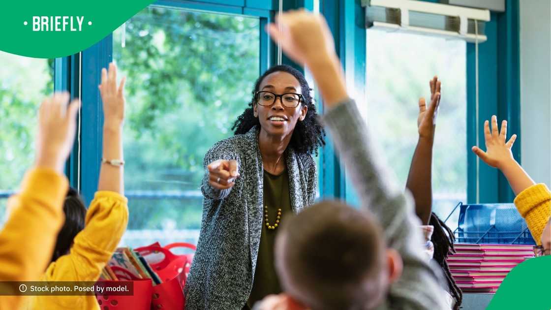 Educator dances for class in video