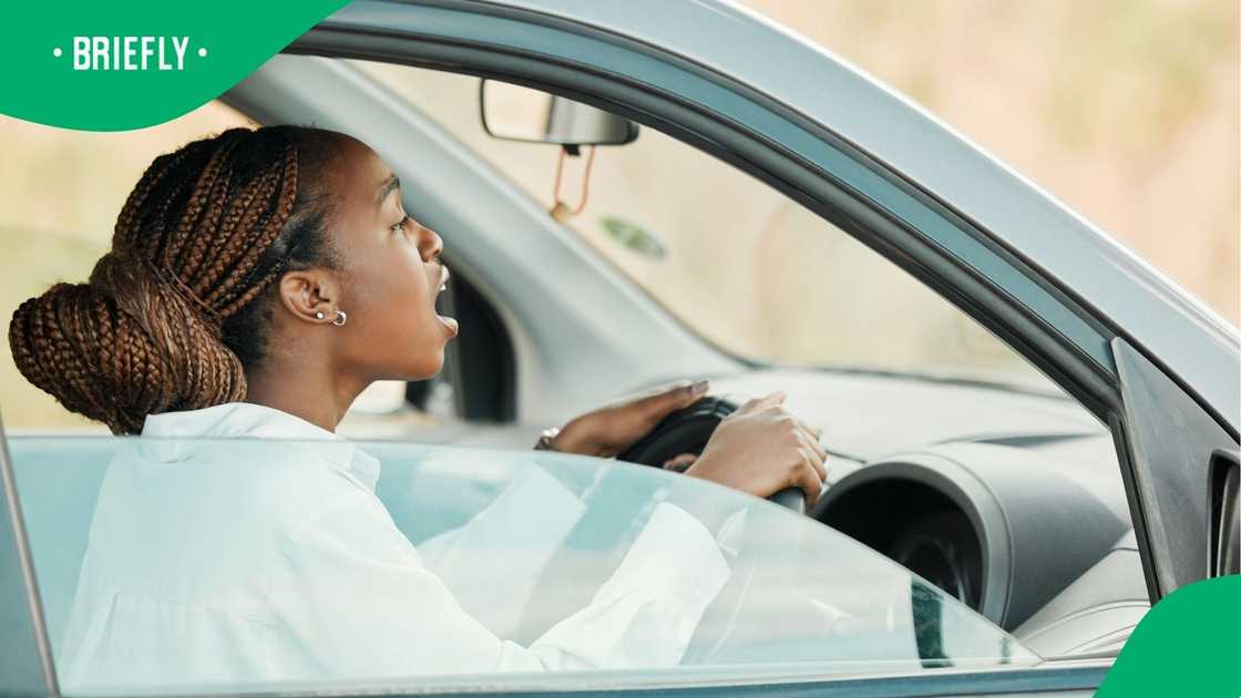 Angry woman on the road was stressed by the commute journey