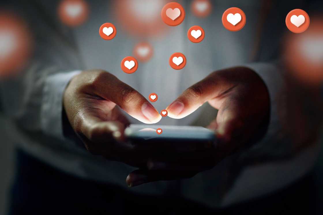 Love emojis emanating from a cell phone. Love emojis emanating from a cell phone.