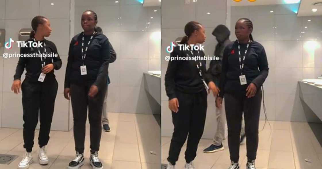 Man walks into ladies bathroom as two friends are dancing Man walks into ladies bathroom as two friends are dancing