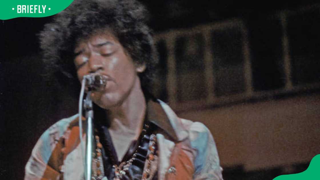 Jimi Hendrix performing onstage Jimi Hendrix performing onstage