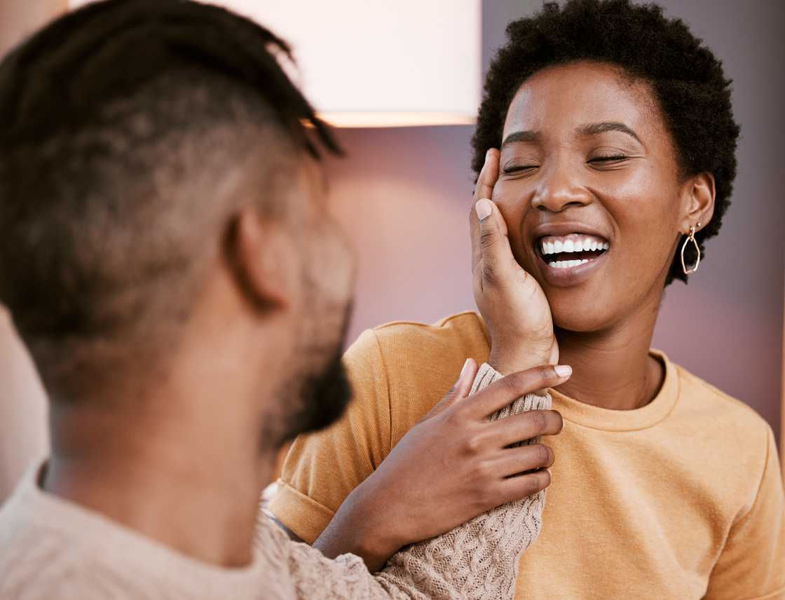A man teasing his girlfriend