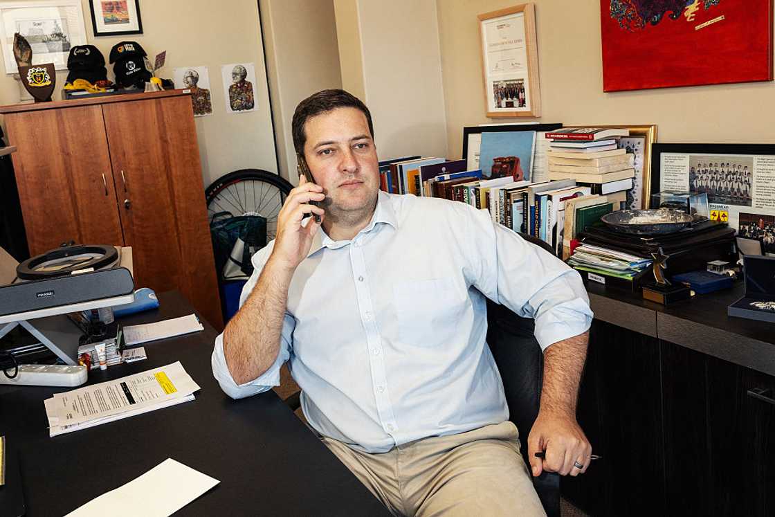 Cape Town executive mayor Geordin Hill-Lewis looks on while on the phone in his office at the Cape Town Civic centre in Cape Town on March 24, 2026.