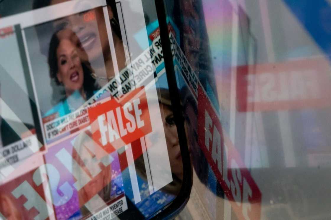 This photo illustration shows a fact-checked image of news anchors where the claim about them was found to be false This photo illustration shows a fact-checked image of news anchors where the claim about them was found to be false