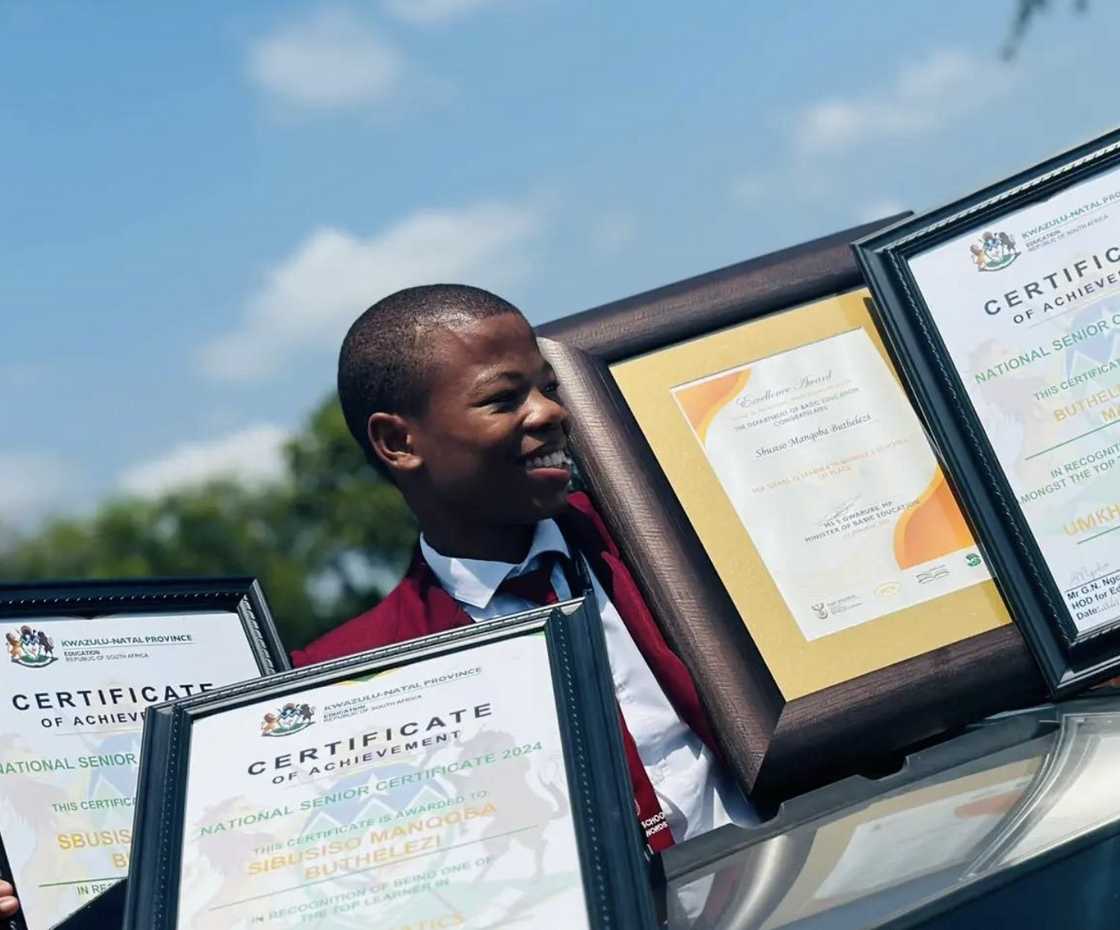 Sbusiso Buthelezi showed of his certificates