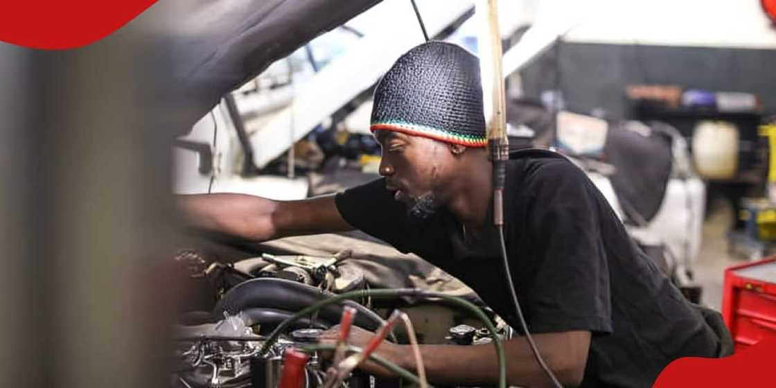 A photo of a mechanic checking a vehicle engine. A photo of a mechanic checking a vehicle engine.