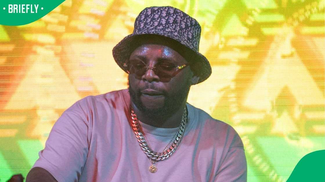 DJ Maphorisa performing on stage. DJ Maphorisa performing on stage.