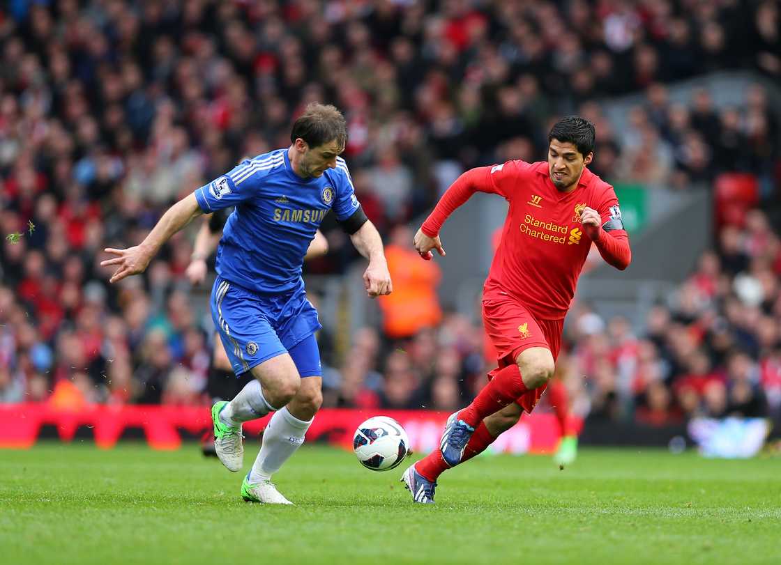 Branislav Ivanovic of Chelsea and Luis Suarez of Liverpool