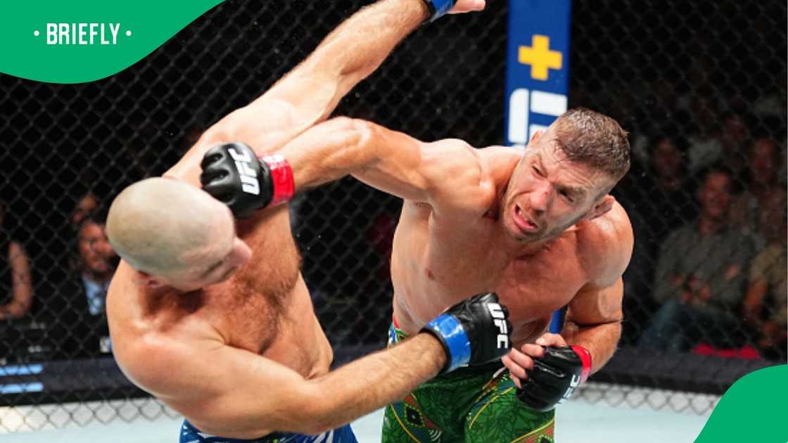 Dricus Du Plessis defeats Sean Strickland in the UFC middleweight championship fight during the UFC 312 event. Dricus Du Plessis defeats Sean Strickland in the UFC middleweight championship fight during the UFC 312 event.