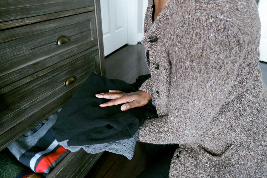 A woman packing clothes