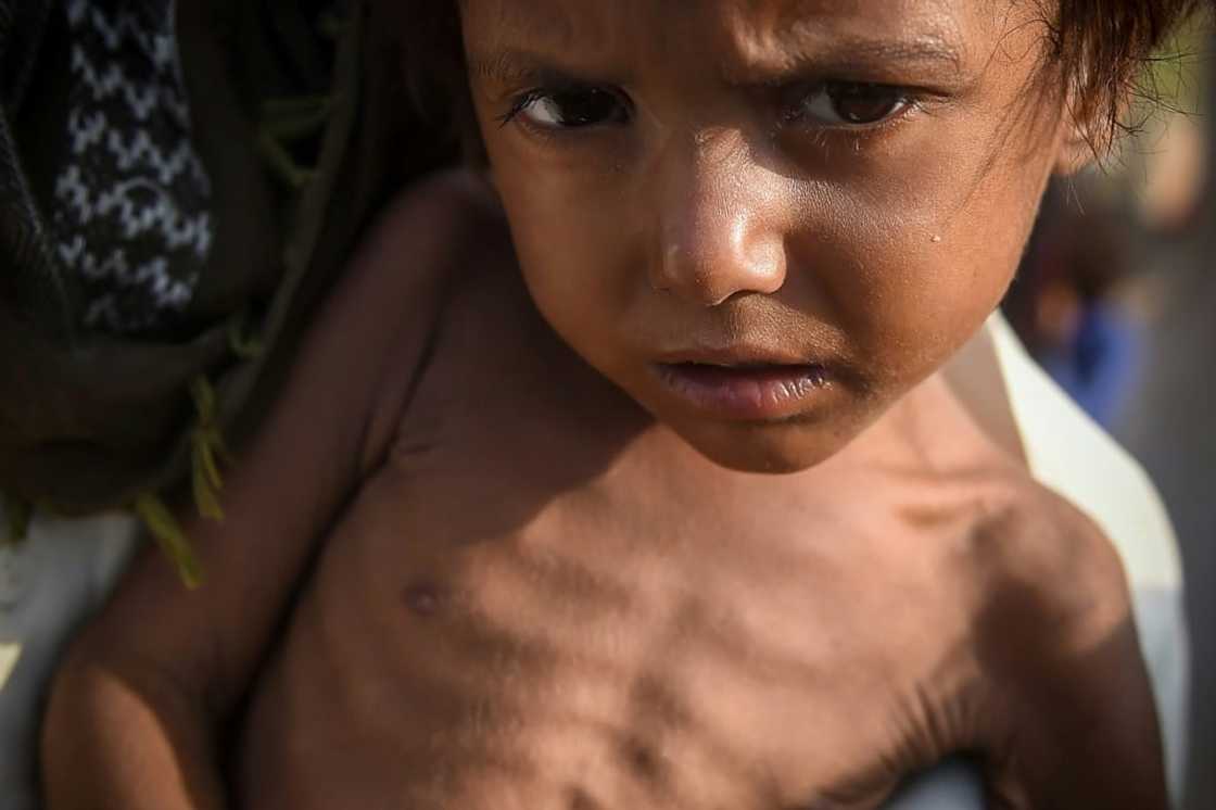 A child in Pakistan whose family has been displaced by catastrophic flooding which put a third of the country under water, photographed on September 26, 2022