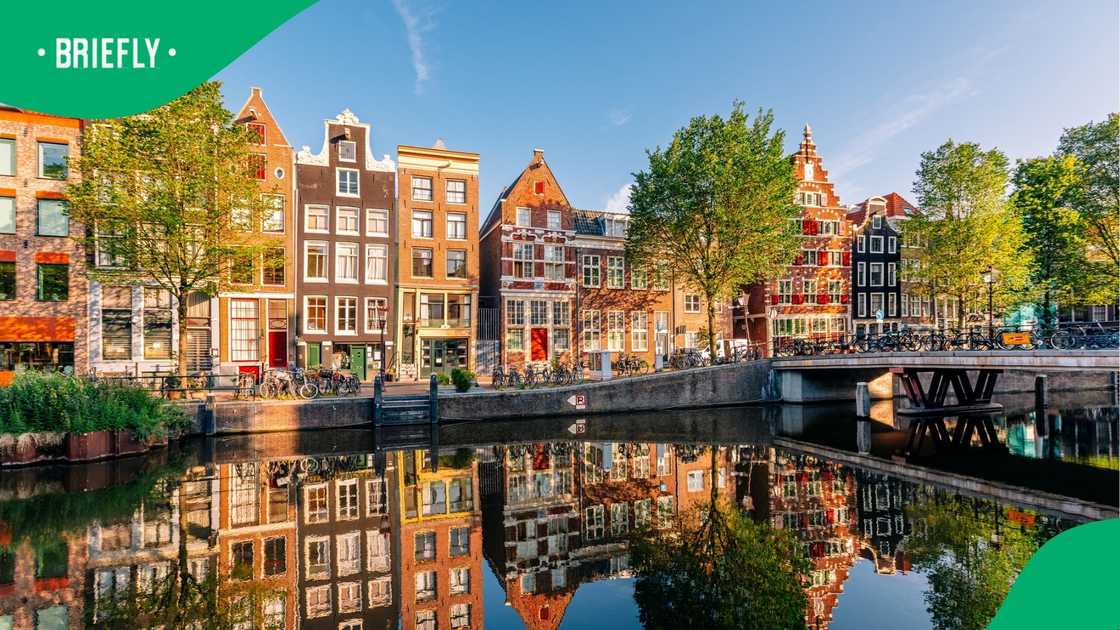 Traditional Dutch houses in Amsterdam. Traditional Dutch houses in Amsterdam.