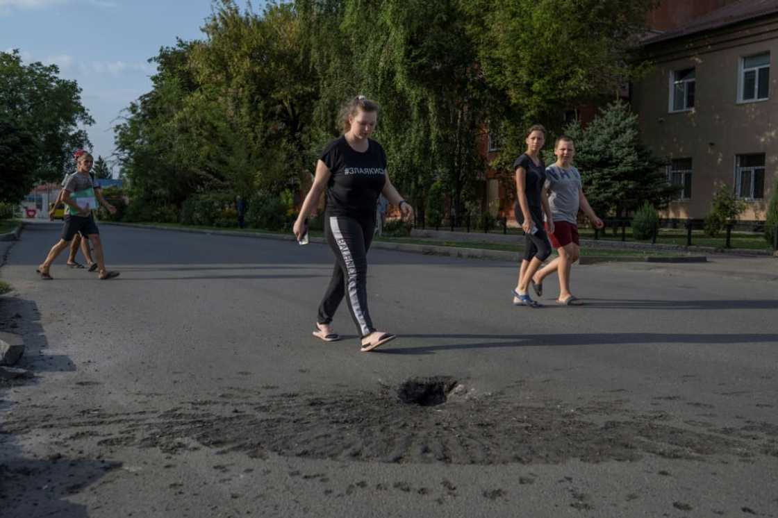 In Marganets and Nikopol -- a short distance down the Dnipro riverbank -- 17 people have been killed in strikes this week In Marganets and Nikopol -- a short distance down the Dnipro riverbank -- 17 people have been killed in strikes this week
