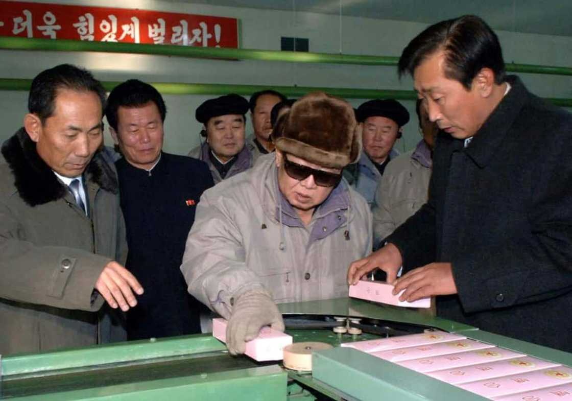 Late North Korean leader Kim Jong-Il visiting a tobacco factory in 2010 Late North Korean leader Kim Jong-Il visiting a tobacco factory in 2010
