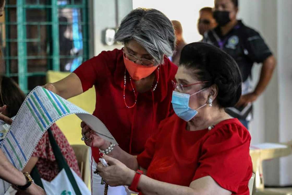 Imelda Marcos (shown here voting in the May 2022 election), the mother of incoming Philippine president Ferdinand Marcos Jr, was a powerful first lady before her husband was ousted from power in 1986