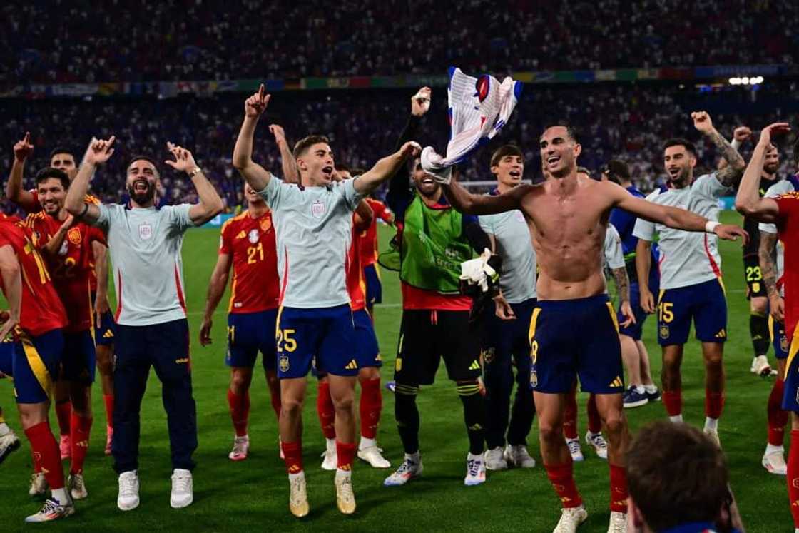 Spain players celebrating after beating France to qualify for Euro 2024 final