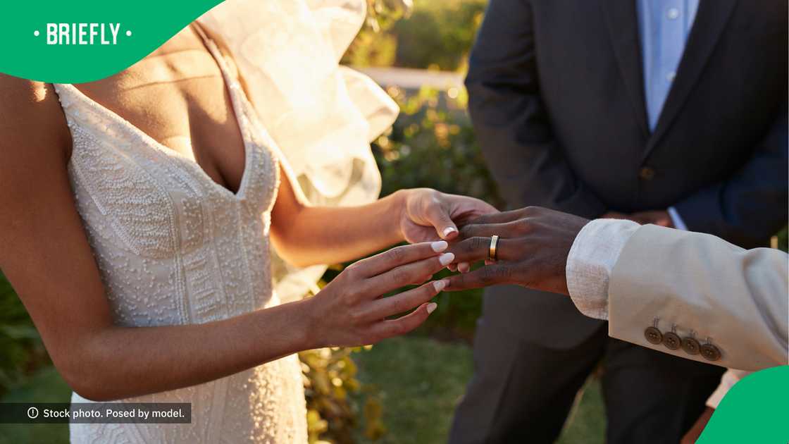 The interracial couple continued celebrating. The interracial couple continued celebrating.