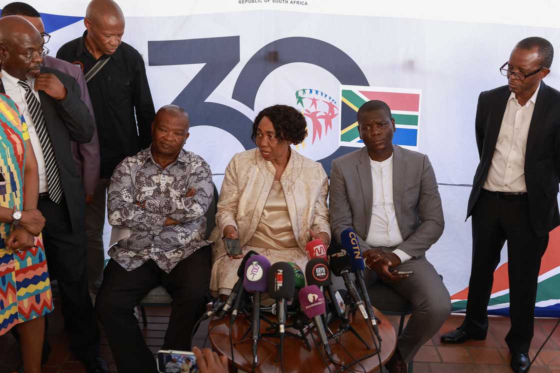 Bantu Holomisa and Angie Motshekga during the press briefing