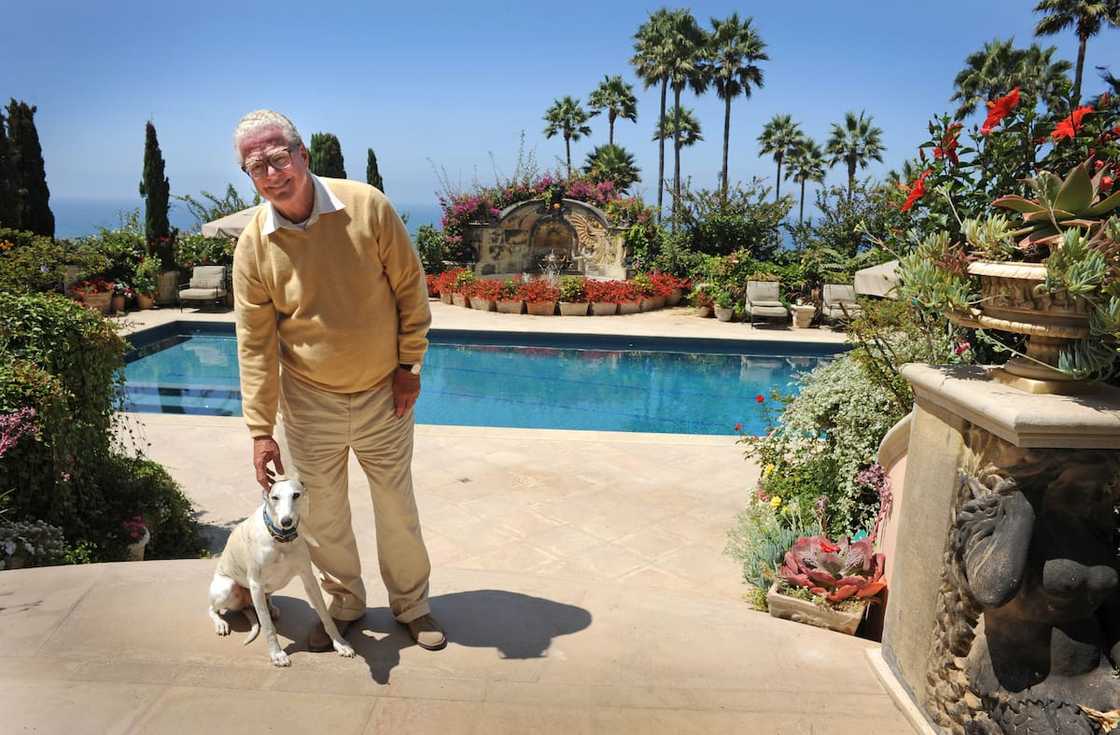 William Lerach stands for a photograph near the swimming pool William Lerach stands for a photograph near the swimming pool
