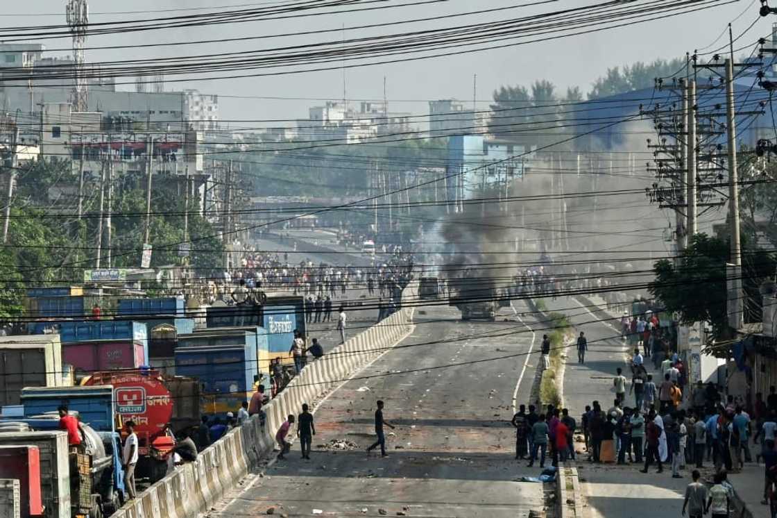 Dozens of factories have been ransacked by striking workers, with several hundred others shuttered by their owners to avoid vandalism Dozens of factories have been ransacked by striking workers, with several hundred others shuttered by their owners to avoid vandalism