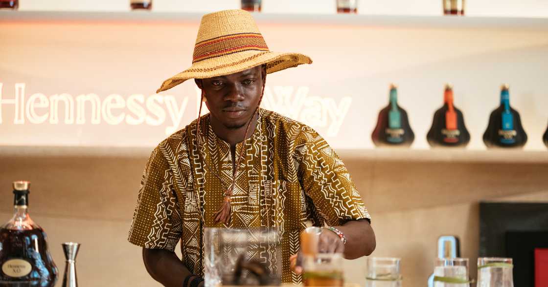 Isaac’s cocktail is a cocoa-forward Old Fashioned that celebrates Ghana’s cocoa heritage. He uses roasted cocoa beans, infused with Hennessy VS, and a cacao pulp syrup made from the whole pod. Isaac’s cocktail is a cocoa-forward Old Fashioned that celebrates Ghana’s cocoa heritage. He uses roasted cocoa beans, infused with Hennessy VS, and a cacao pulp syrup made from the whole pod.