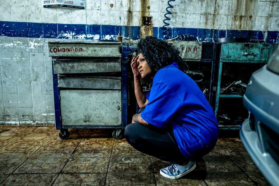 A stressed out female mechanic A stressed out female mechanic