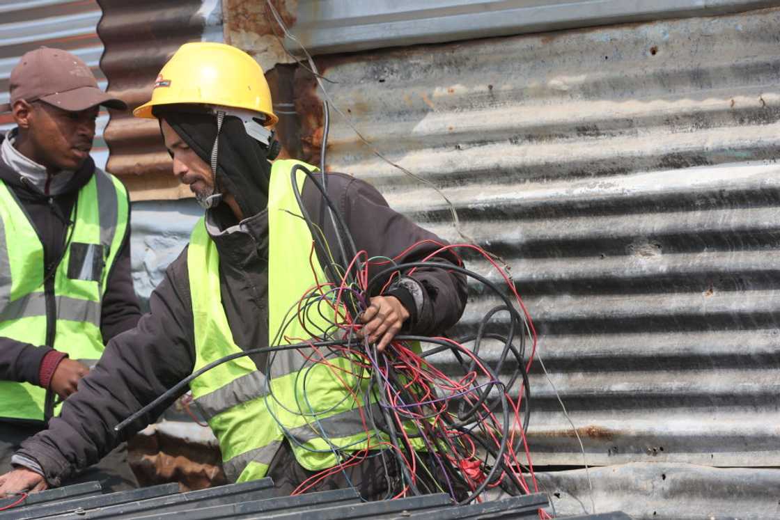 City Power employees removed illegal connections in Alexandra, Johannesburg City Power employees removed illegal connections in Alexandra, Johannesburg