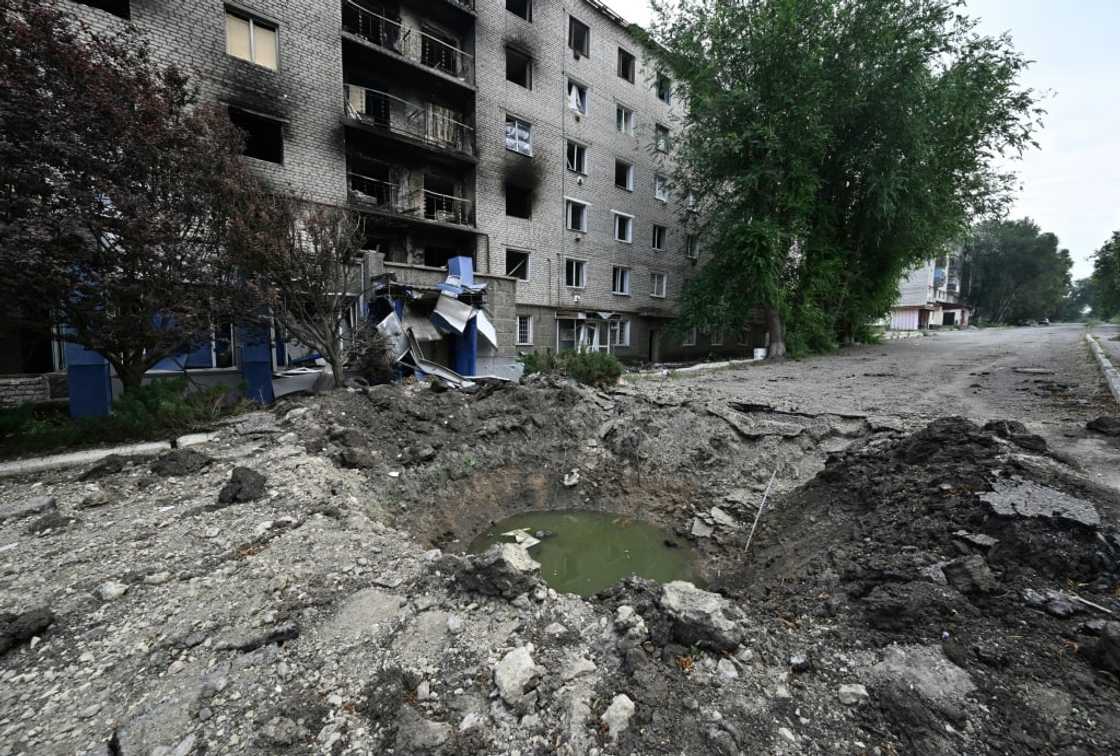 A shell crater in Siversk, 20 kilometres from the frontline in eastern Ukraine