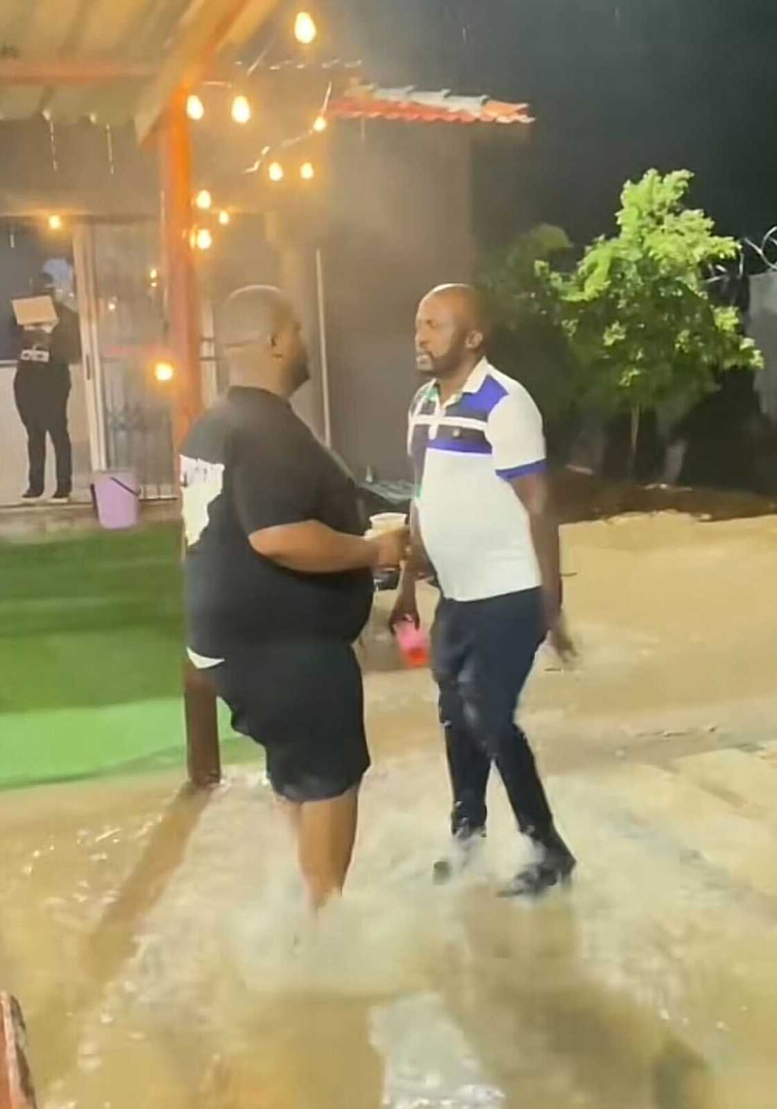 A TikTok video shows gents dancing in the rain, which amused Mzansi.