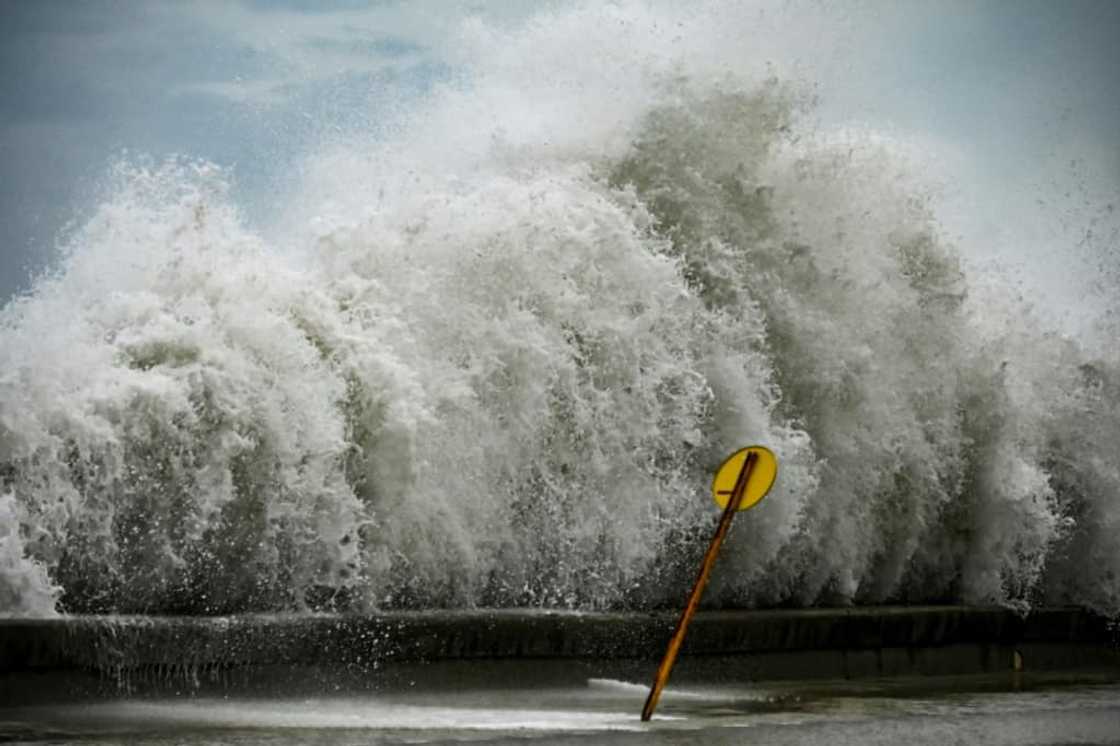 Huge waves spill over the famous Malecon esplanade in Havana as Hurricane Ian batters the island nation