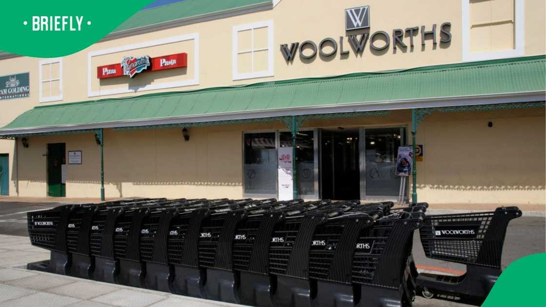 Plastic supermarket trollies were stacked in line outside a South African Woolworths store Plastic supermarket trollies were stacked in line outside a South African Woolworths store