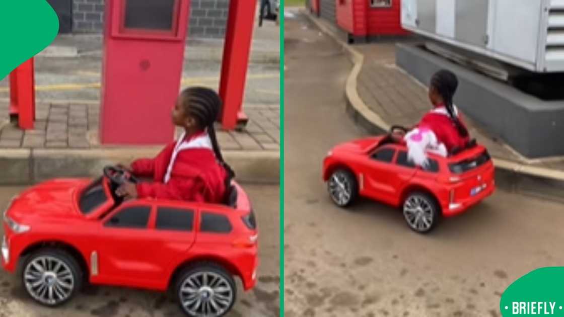 The young girl was driving her mini red car