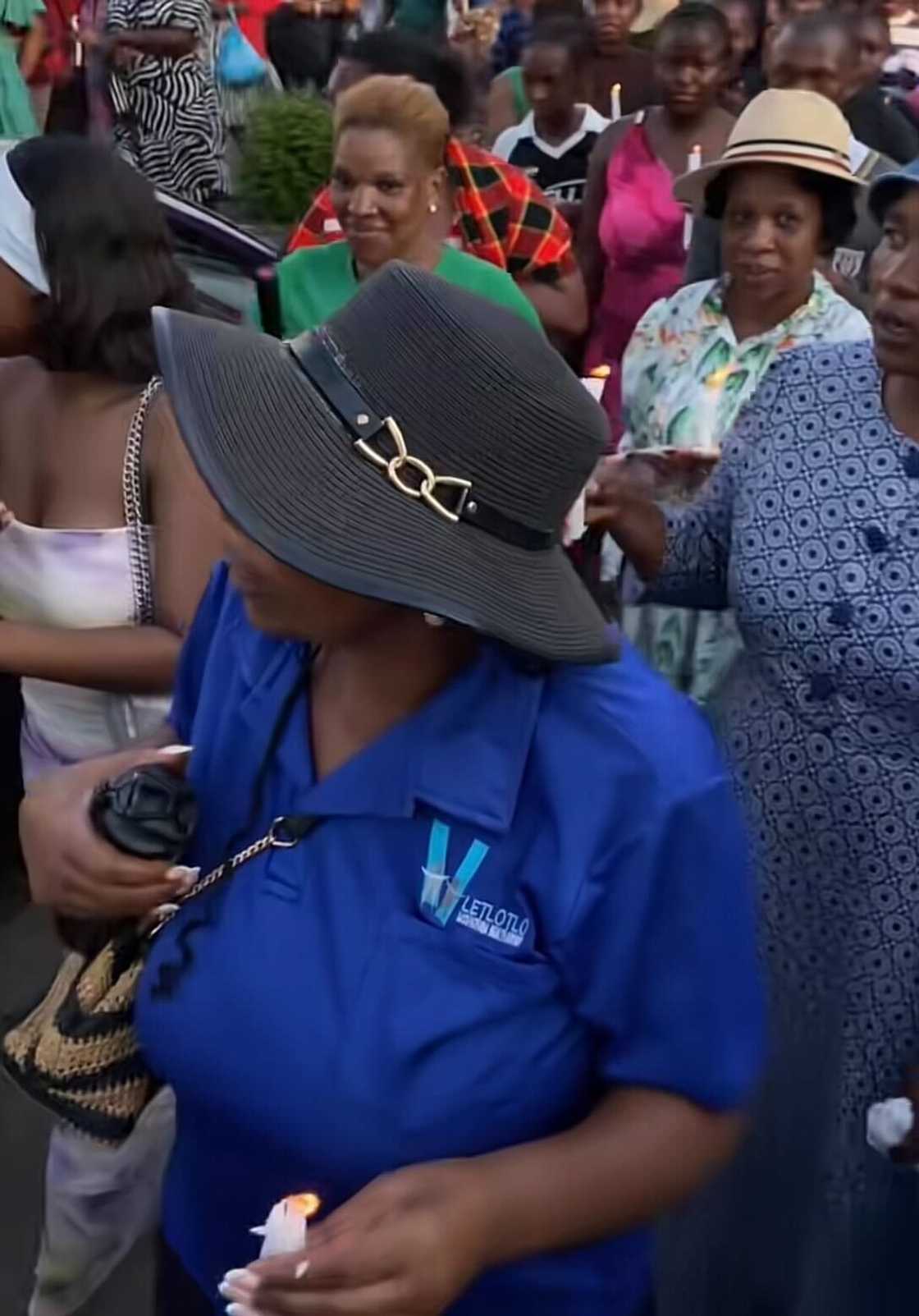 Women walked around the Vaal community with candles in honour of the 14 pupils who lost their lives. Women walked around the Vaal community with candles in honour of the 14 pupils who lost their lives.