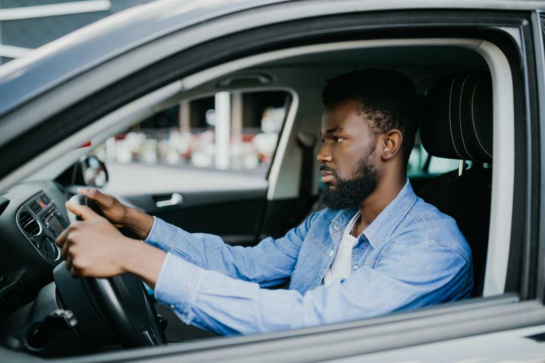 An angry man inside his car An angry man inside his car