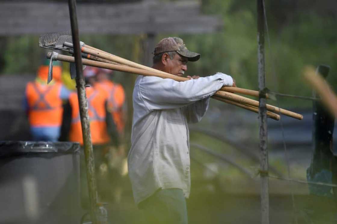 Several hundred rescuers are taking part in efforts to save the miners Several hundred rescuers are taking part in efforts to save the miners