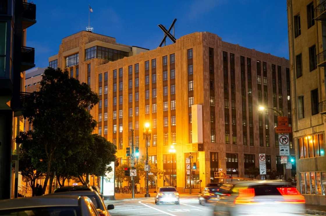 An X sign is seen on the roof of the headquarters of social media platform X, formerly known as Twitter